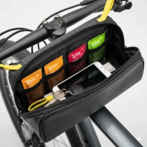 Inside view of the top tube bike bag showing storage for phone, keys, and energy gels.