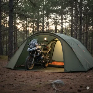 A specialized tent with a large porch for bike storage among motorcycle camping accessories.
