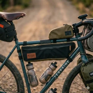 Thick shock-absorbing handlebar tape and cockpit gravel bike accessories installed on flared drop bars.